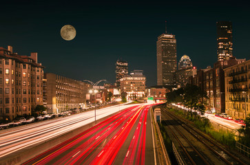 Fototapeta na wymiar Light streaks on the highway during the moon night at Boston