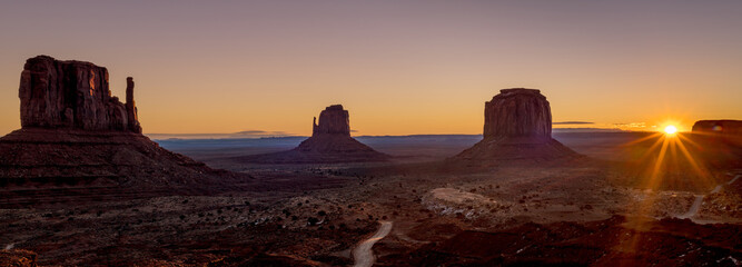 Sunrise over Monument Valley Arizona with sunburst