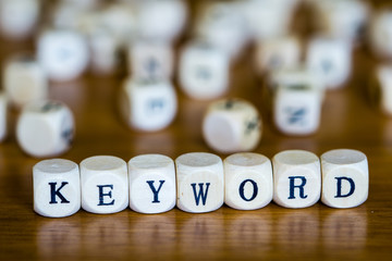 Keyword written with wooden cubes