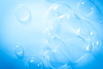 Beautiful abstract close up color white and blue soap bubbles background and wallpaper