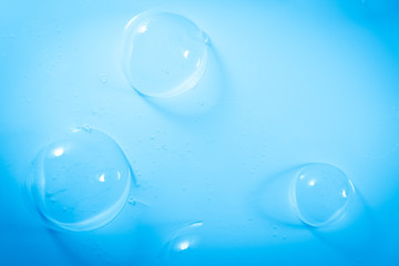 Beautiful abstract close up color white and blue soap bubbles background and wallpaper
