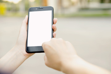 Woman using her Mobile Phone