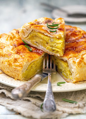 Cut French pot pie with potatoes.