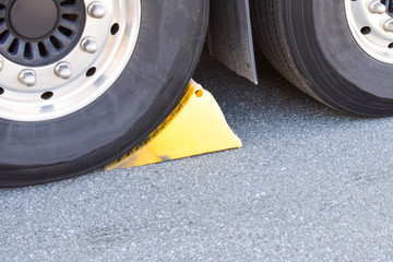 Wheel chocks. Device for safe parking of a truck.