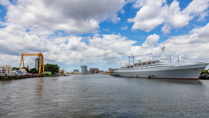 Harbor of Rotterdam, Netherlands. Cruise ship anchored at port