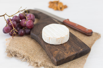 Blue cheese or brie with grapes and nuts