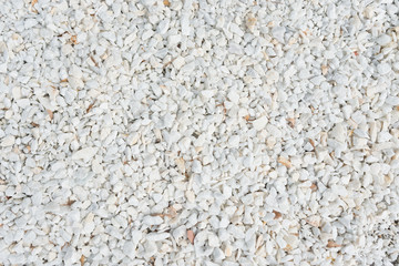 Small gravel stones, little scree texture macadam background