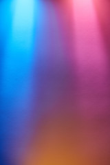 Intersecting multicolored rays of light