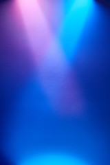 Intersecting multicolored rays of light