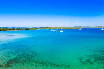 Beautiful seascape on Adriatic in Croatia, Dugi otok archipelago, yachts anchored in blue bays