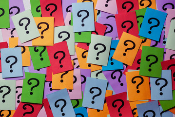 Background texture of multicolored question marks