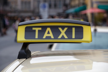 Taxi sign of a cab in Munich, Germany, 2015