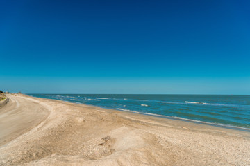 Fototapeta na wymiar Beach on the Mexican Gulf. Sand, sea and sky. Mexico.
