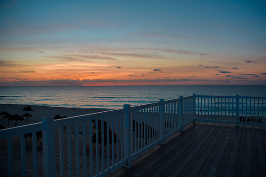 Dawn in the Caribbean Sea. Railing observation deck at sea.