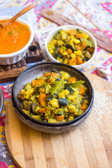 Indian sabji - traditional homemade vegetable's stew with spices. Tomato, potato, aubergine, carrot.