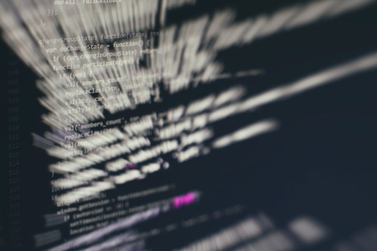 Monitor closeup of function source code. Abstract IT technology background. Software source code.