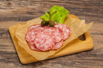 Fototapeta premium Spanish Salchichon sausage with salad