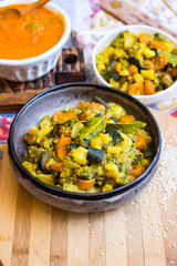 Indian sabji - traditional homemade vegetable's stew with spices. Tomato, potato, aubergine, carrot.