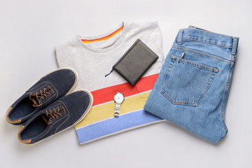 Stylish male look with jeans clothes on white background