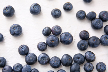 Many ripe blueberry on white background