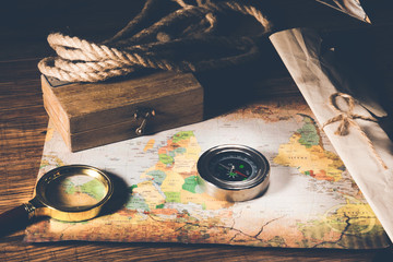 compass with magnifier on the map