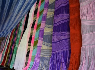 colorful scarves for sale at the market