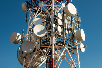 Telecommunications antenna for radio, television and telephony whit cloud and Blue sky