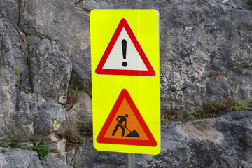 Road signs. Road signs point to construction site.
