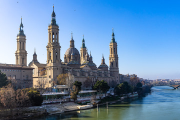 Cathedral of Our Lady of the Pillar (Nuestra Señora del Pilar) seen from Puente de Piedra bridge on the Ebro river, Zaragoza, Aragon, Spain