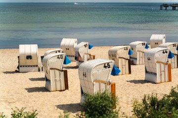  Beach chair on sand beach of baltic sean, Germany