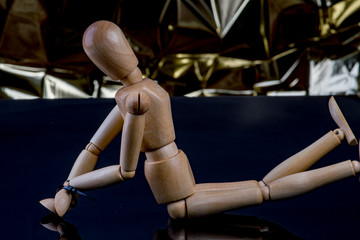 Wooden male Bound on the floor