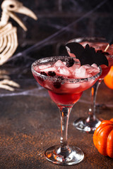 Halloweens spooky drink with blackberry