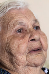 Elderly Senior Woman, serious and with wrinkle marks of age