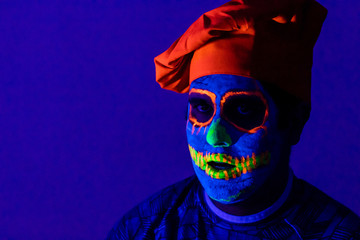 Man with neon makeup for a Neon Party For halloween