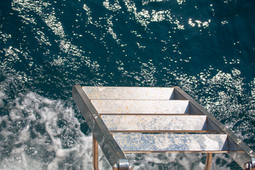 Ship gangway against sea water 