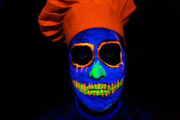 Man with neon makeup for a Neon Party For halloween