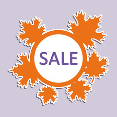 A circle-shaped sticker with maple leaves and a writing "SALE"