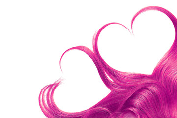 Pink hair in shape of heart, isolated on white background
