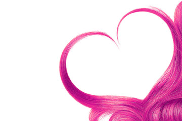 Pink hair in shape of heart, isolated on white background