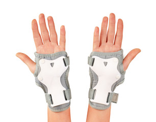 Roller skater wearing wards guards protector pads, wrist protection on hands woman