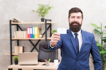 Card design. Call now. Guy formal suit stand in office. Accountant or banker. Businessman hold blank card. Useful contacts. Bearded hipster top manager show card. Banking services for small business