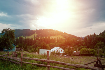 Obraz premium Mountain, beautiful landscape, a village in the mountains, summer. Ukraine, the Carpathian Mountains. Concept of travel, tourism, holidays, vacation