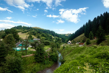 Mountain, beautiful landscape, a village in the mountains, summer. Ukraine, the Carpathian Mountains. Concept of travel, tourism, holidays, vacation