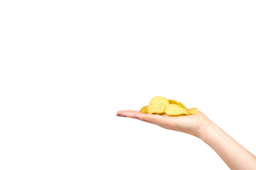 Fototapeta premium Hand with golden color potato chips, crunchy and wavy.