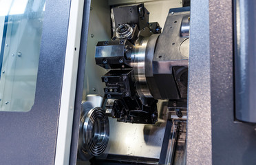 metalworking industry. drilling hole on modern metal working machining center