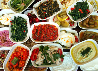 Traditional Turkish appetizer foods on the restaurant table.