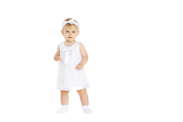 beautiful little girl all in white clothes
