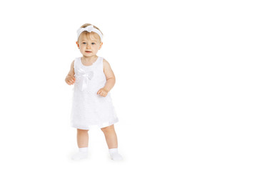 beautiful little girl all in white clothes