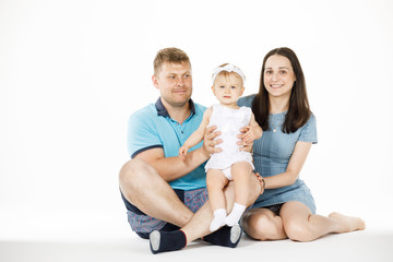 mom dad and daughter on white background