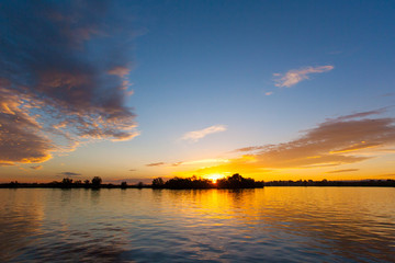 Fototapeta na wymiar Beautiful Sunset Reflecting Off The Water